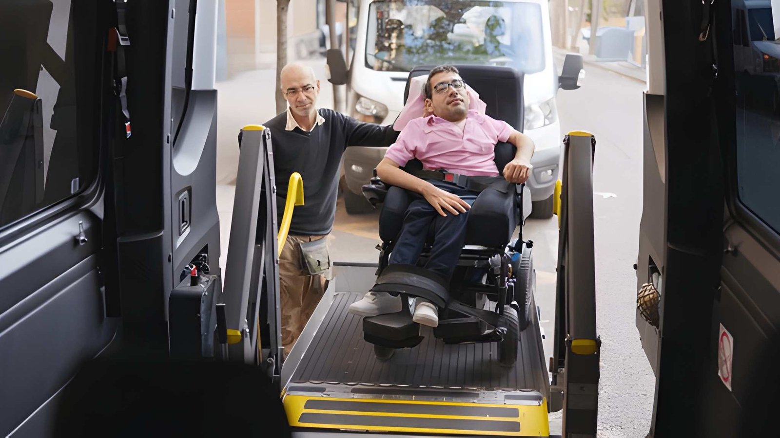 Wheelchair passenger boarding an accessible maxi taxi using a wheelchair ramp in Melbourne
